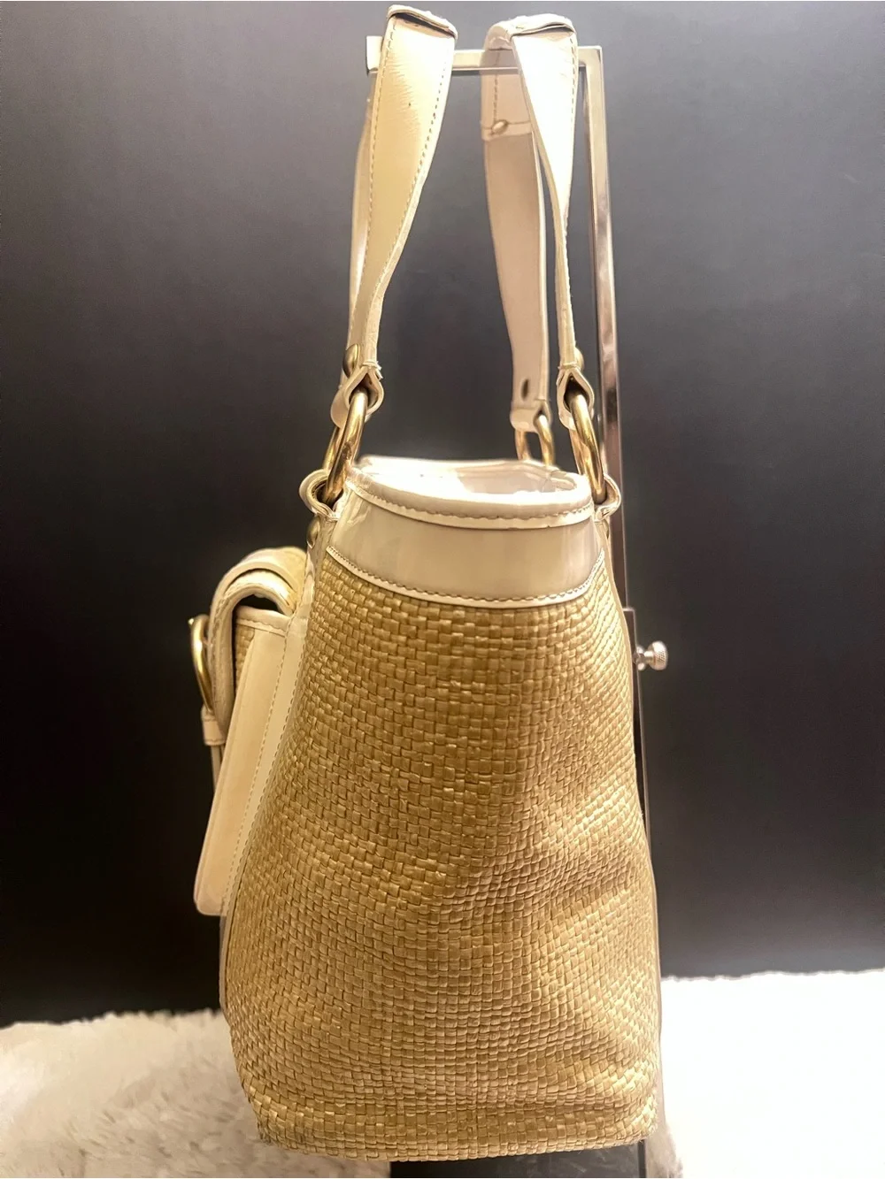 Coach white leather and straw tote.